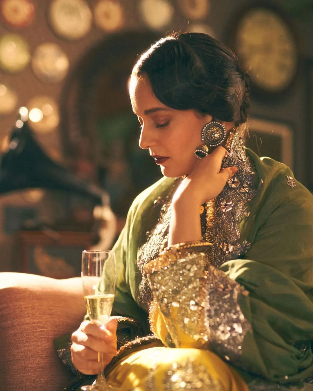 Kangana Ranaut holding a wine glass